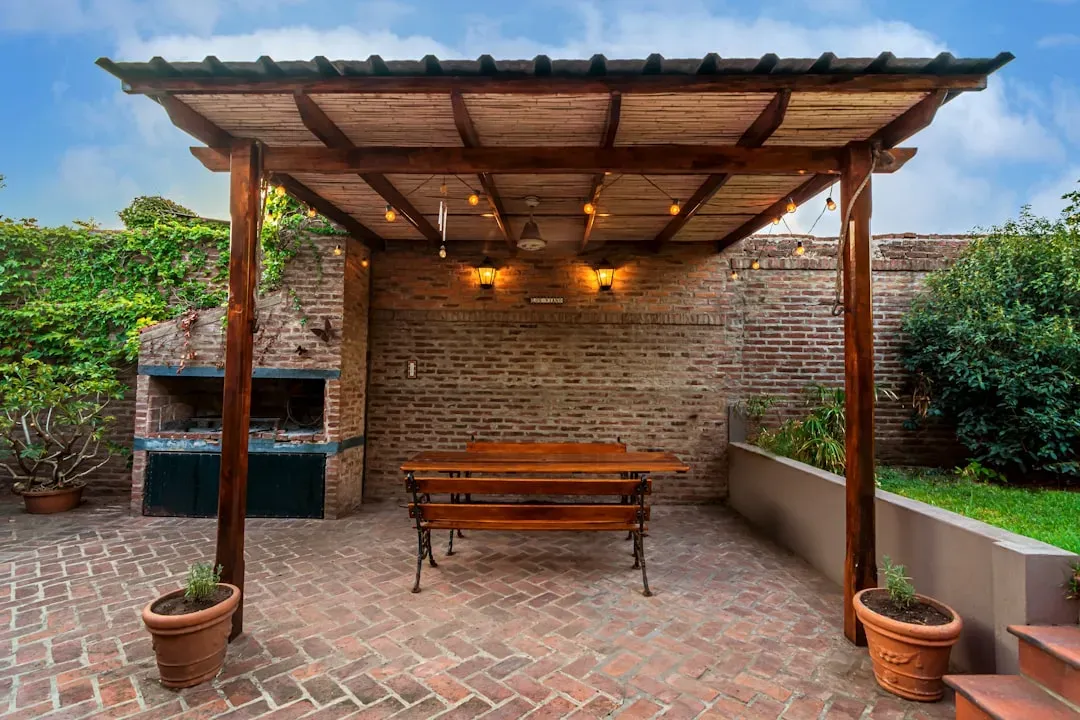 Zoned patios for cooking, dining, and lounging (Image Credits: Unsplash)