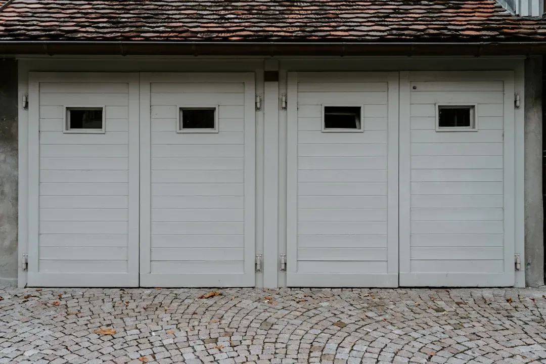 8. Carriage-Style Garage Door Hardware (Image Credits: Unsplash)