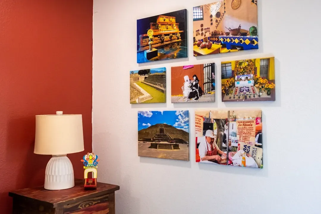 4. Grouping art and photos in a gallery wall (Image Credits: Unsplash)
