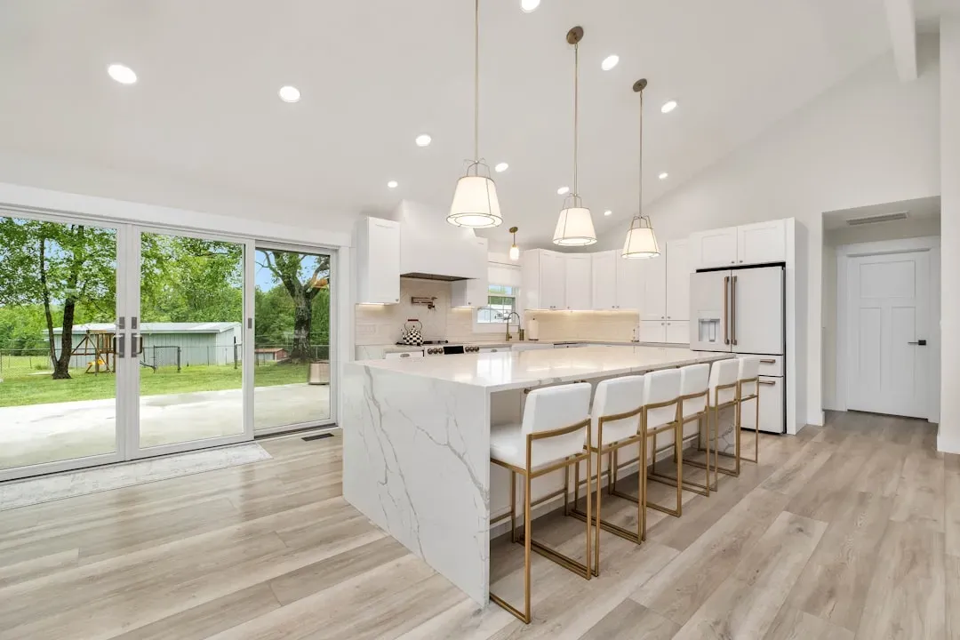 Pendant Lights Over an Island Do More Than Decorate (Image Credits: Unsplash)