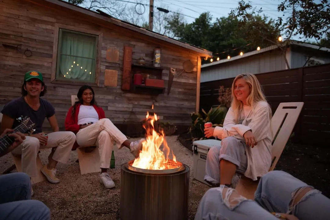 Set up a fire pit for cooler evenings (Image Credits: Unsplash)