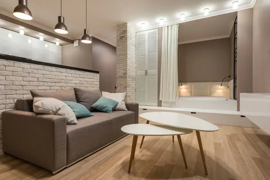 2. Layered lighting instead of a single overhead fixture (Image Credits: Pexels)