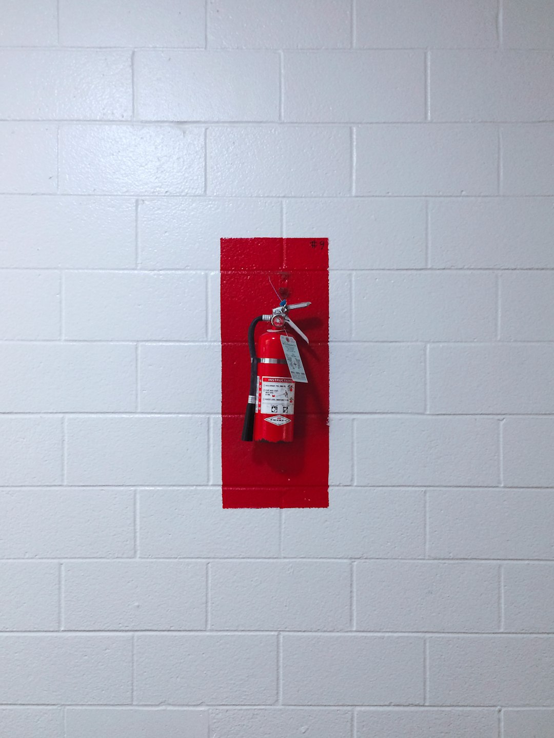 Wall-Mounted Fireproof Safes Behind Hidden Panels (image credits: unsplash)