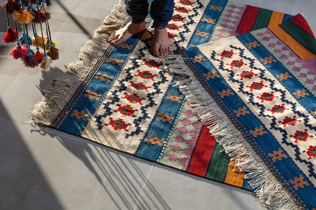 Statement rugs anchoring the space (Image Credits: Unsplash)