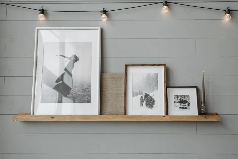 Try a picture ledge for a display that can grow with you (Image Credits: Pexels)