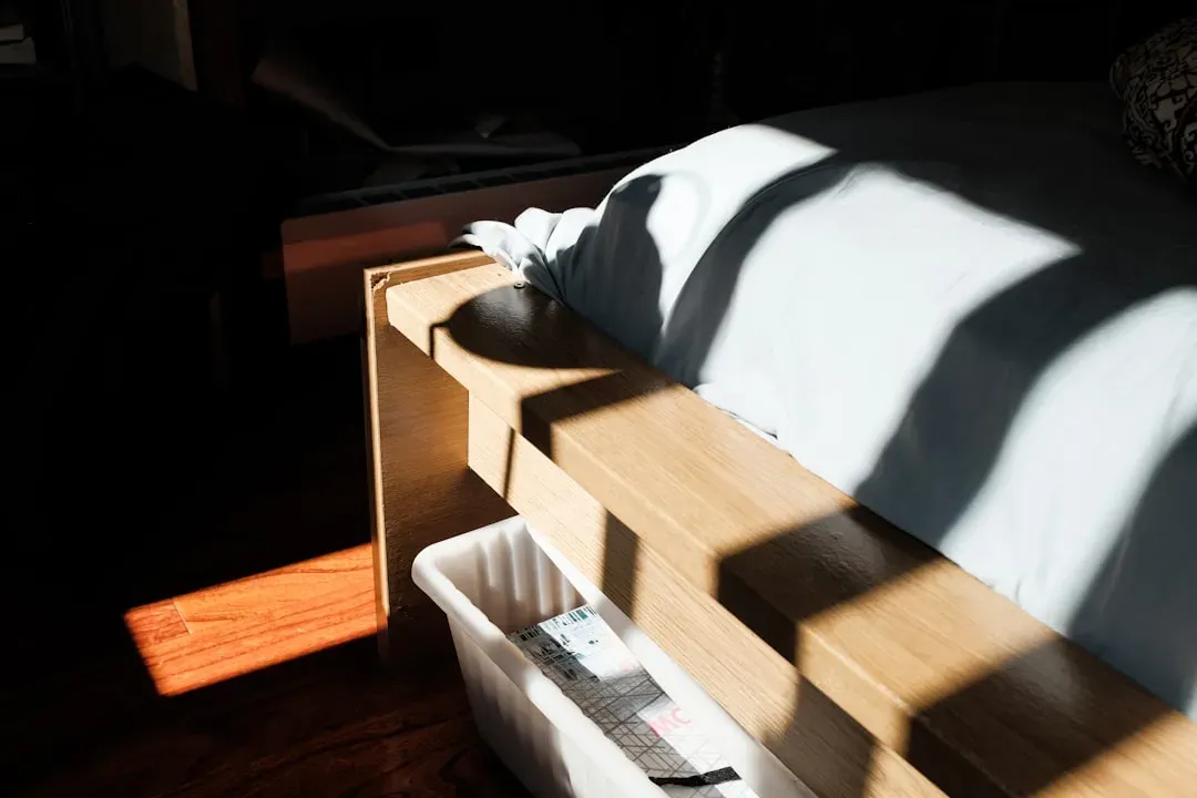 Under Bed Storage Solves the Bedroom Clutter Problem (Image Credits: Unsplash)