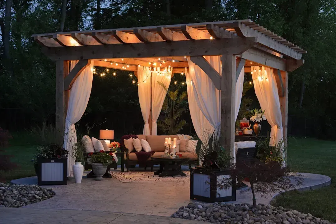 A pergola with simple string lighting (Image Credits: Unsplash)