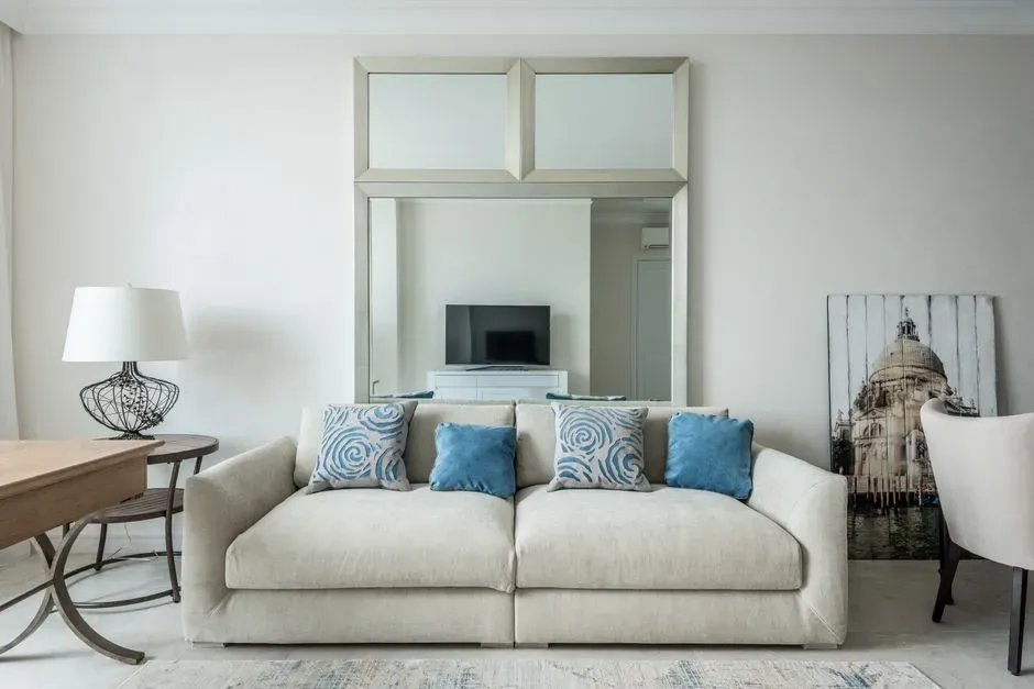 9. Creating a focal point above the fireplace or sofa (Image Credits: Pexels)