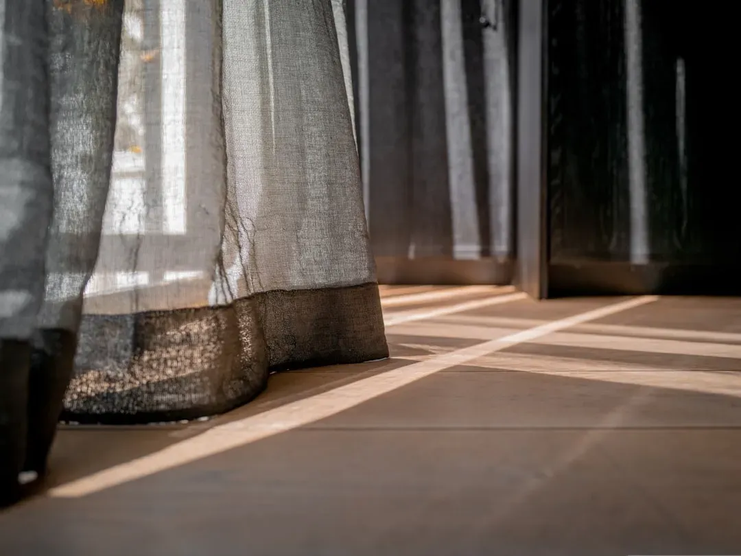 3. Floor-to-Ceiling Drapery in Natural Fabrics (Image Credits: Unsplash)
