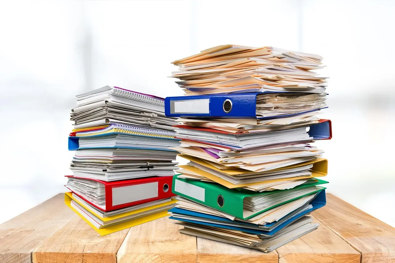 2. Stacks of Paper and Mail Clutter (Image Credits: Pixabay)