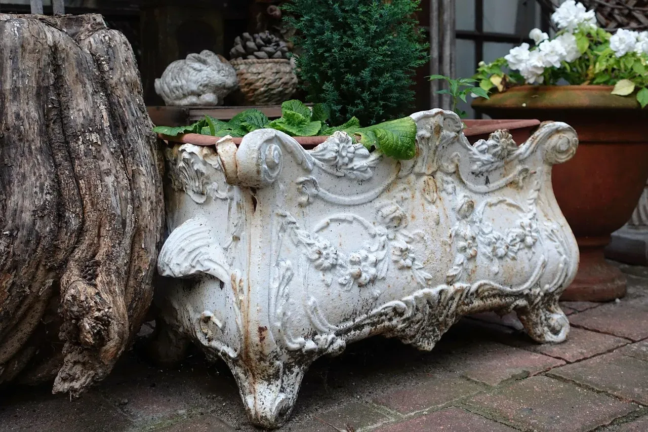 4. Repurposed vintage containers as statement planters (Image Credits: Pixabay)