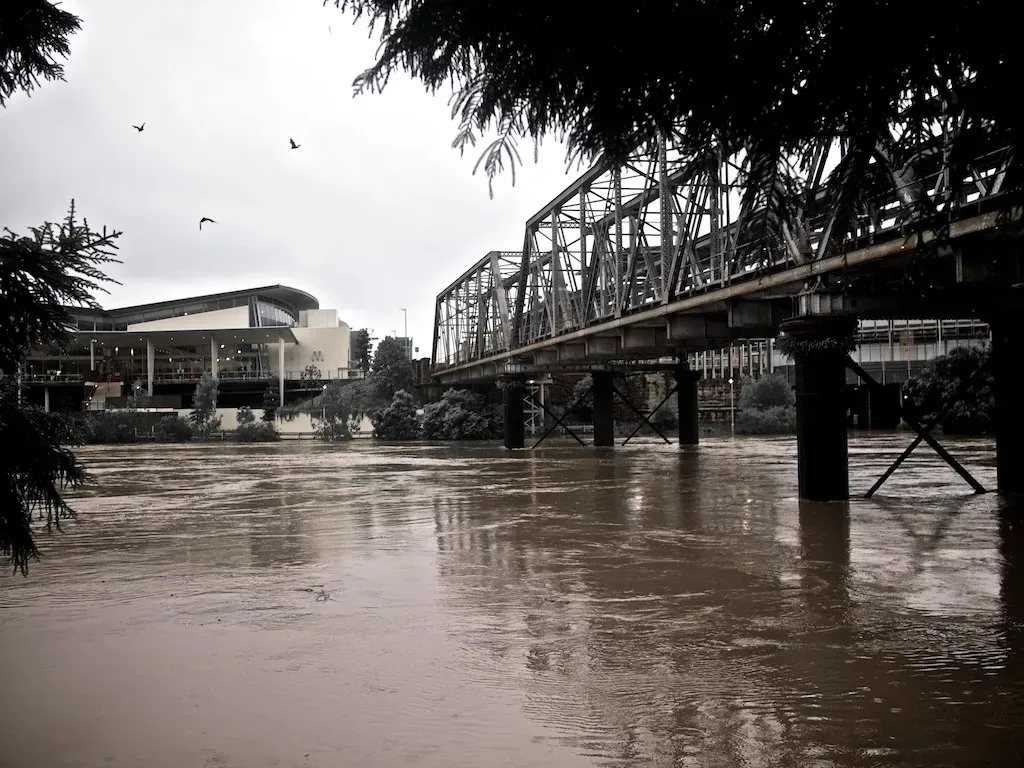 Rivers that can rise dozens of feet in under an hour (Flickr: Bremer river in flood, still rising, 6-00pm 11-01-11, CC BY 2.0)