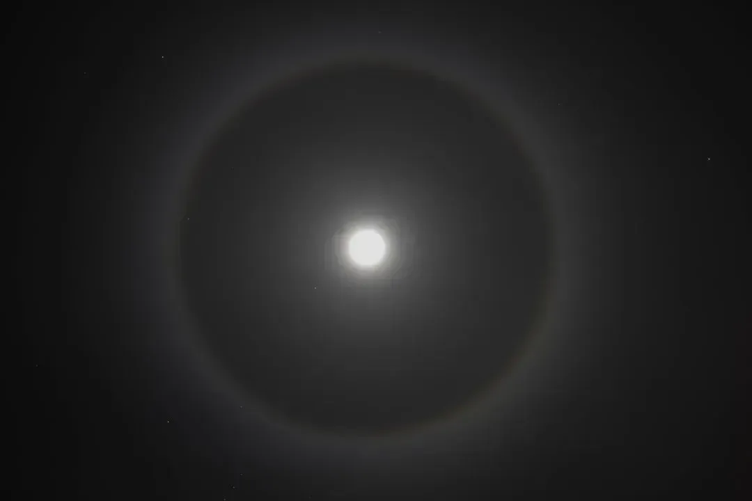 2. "Ring Around the Moon, Rain or Snow Coming Soon." (Image Credits: Unsplash)