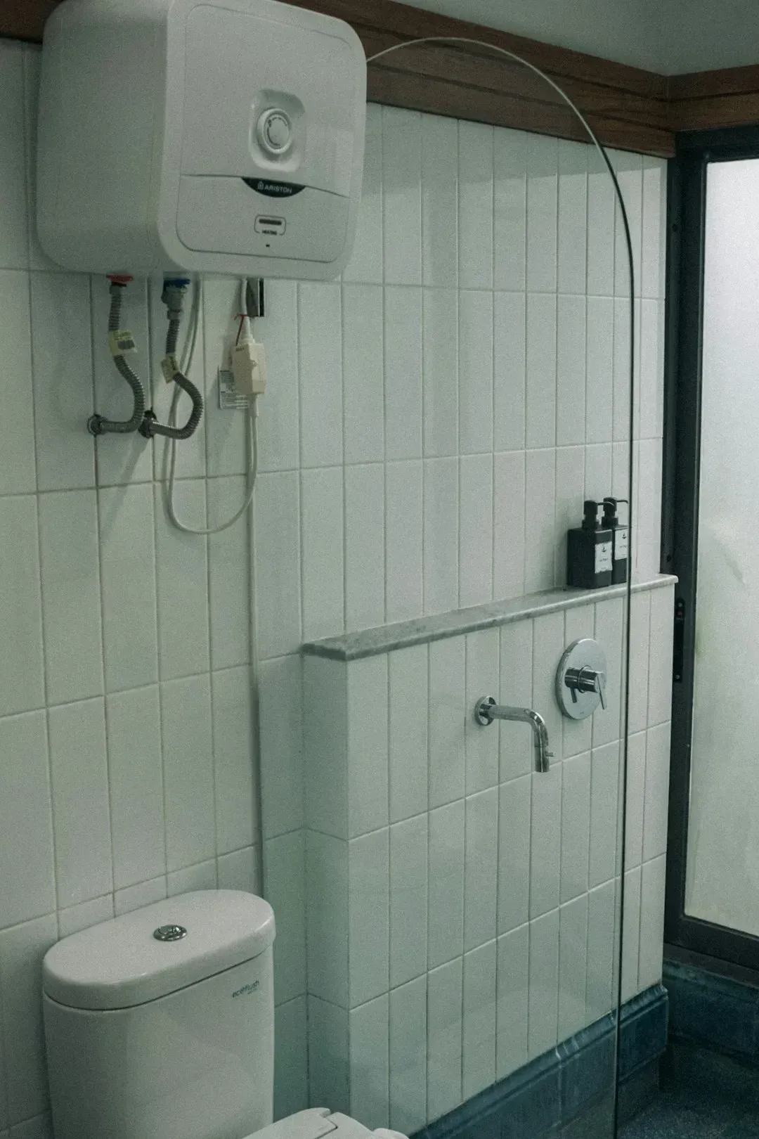 3. Electric Water Heaters, Especially Older Tank Models (Image Credits: Unsplash)