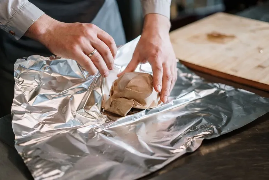 4. Reusing aluminum foil and plastic wrap multiple times (Image Credits: Pexels)