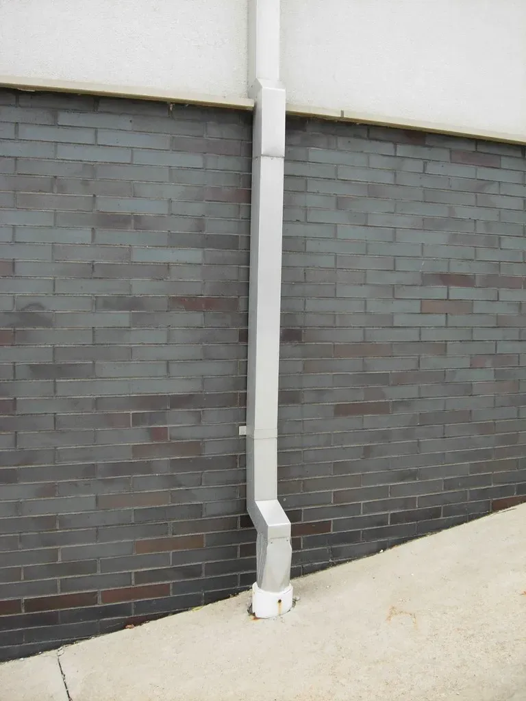 Directing Downspouts Onto Neighboring Property (Image Credits: Flickr)