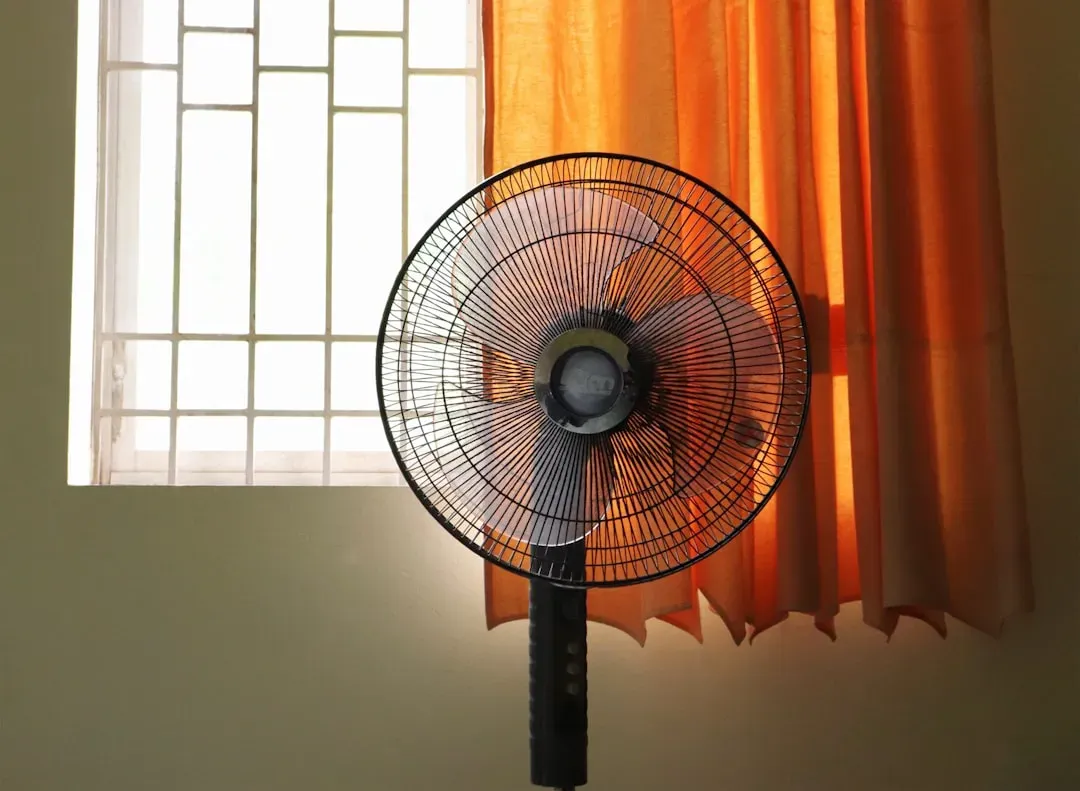 Using Electric Fans When Temperatures Soar Above 95°F (Image Credits: Unsplash)