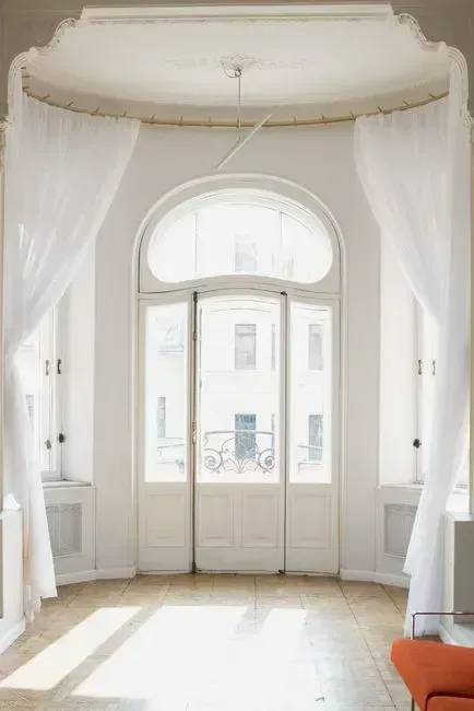 4. Transom windows above doors for passive ventilation (Image Credits: Pexels)