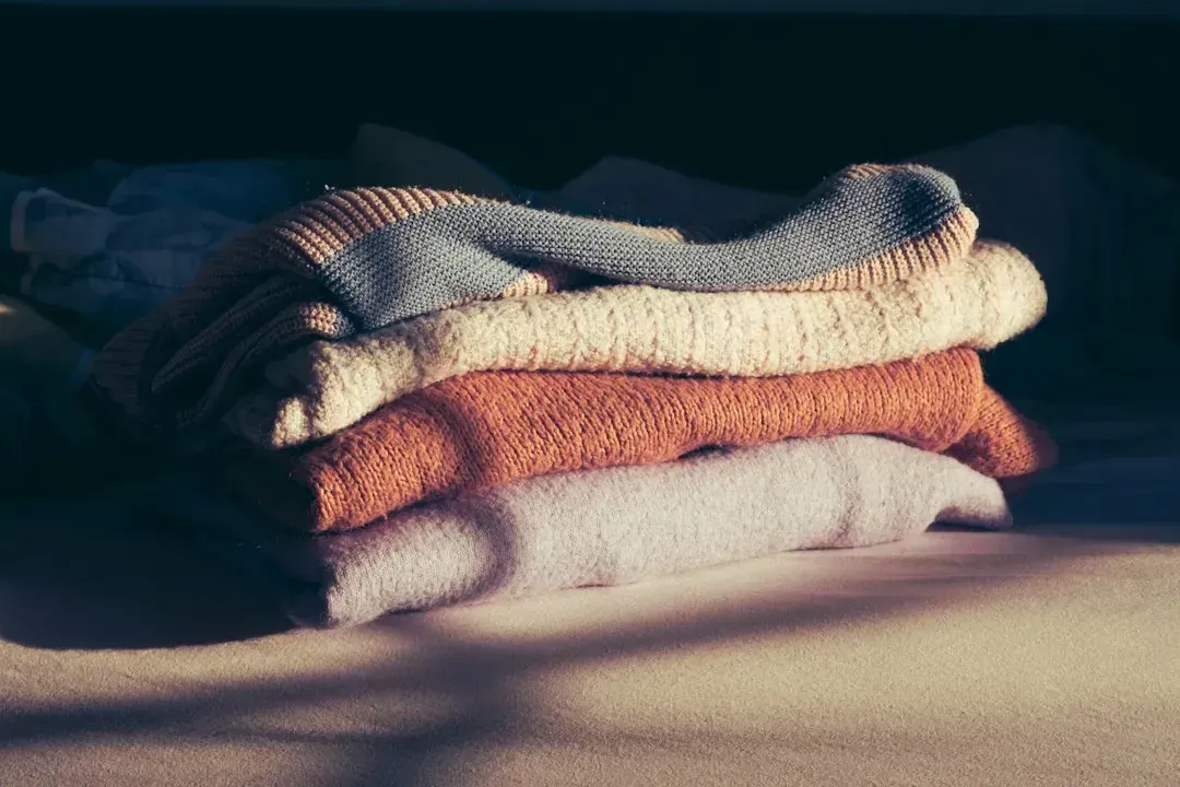 2. Extra warm clothing (Image Credits: Unsplash)