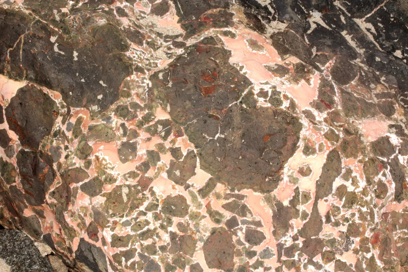 #8 - Cemented Rock Sometimes Preserves History That's Been Erased Everywhere Else (Breccia, Public domain)