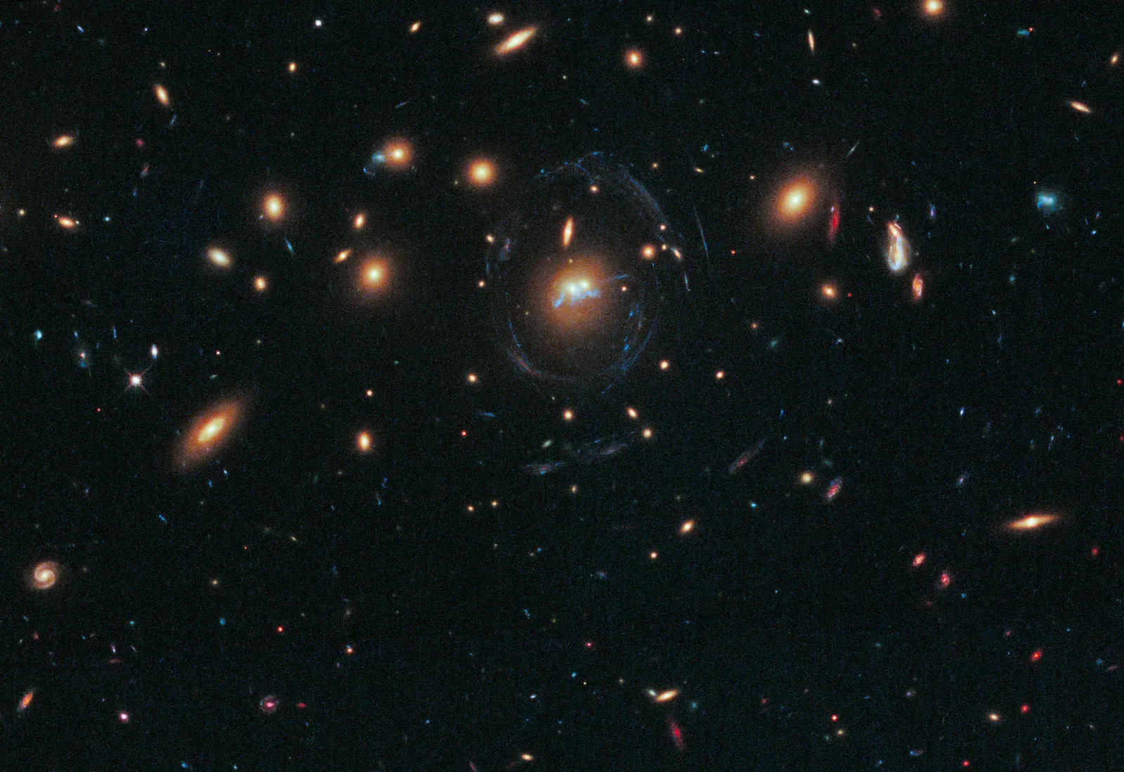 What These Ancient Stars Reveal About The Milky Way’s Violent Youth (Hubble Sees Spiral Bridge of Young Stars Between Two Ancient Galaxies, Public domain)
