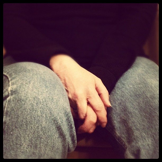 Self-Adaptor Movements Betray Hidden Tension (Image Credits: Flickr)