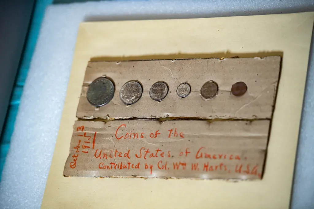 #2 - Coins Pressed Into Foundations for Luck (Image Credits: Flickr)