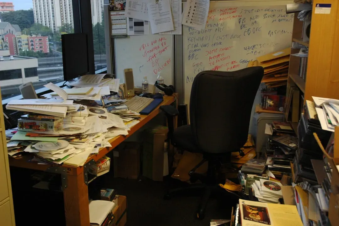 Your Desk Looks Like a Paper Tornado Hit It (Image Credits: Unsplash)
