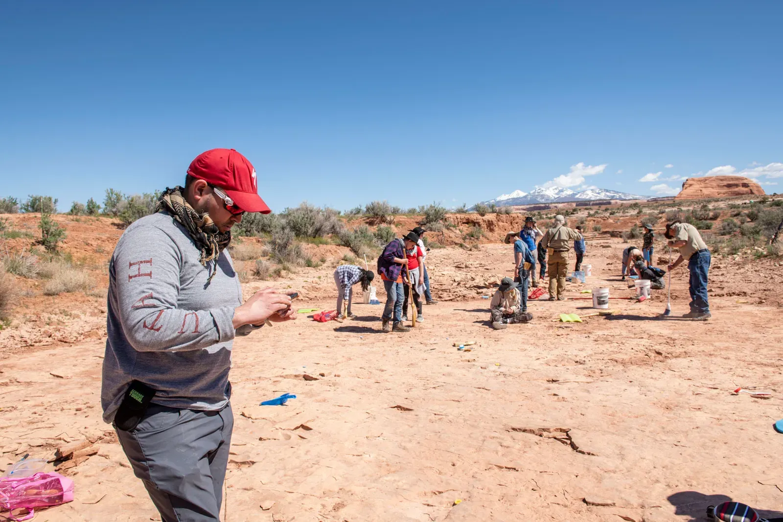 How do we know any of this? Fossils, fieldwork and clever detective work (Conducting fieldwork with BLM Paleontologists near Moab, UT. Photo by Eric Delphenich, Public domain)