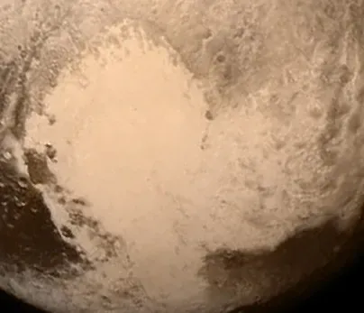 #2: “Pluto the Planet” Meets the Heart-Shaped Reality (By National Aeronautics and Space Administration (NASA) / Applied Physics Laboratory, Public domain)