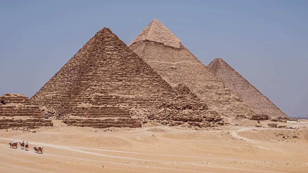 2. The Pyramids of Giza, Egypt – Monuments That Defy Explanation (Image Credits: Unsplash)