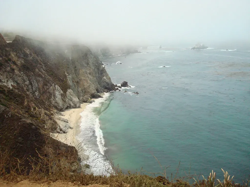 Cancer: Misty Coastal Cliffs and Hidden Coves (MelissaGalvez, Flickr, CC BY 2.0)
