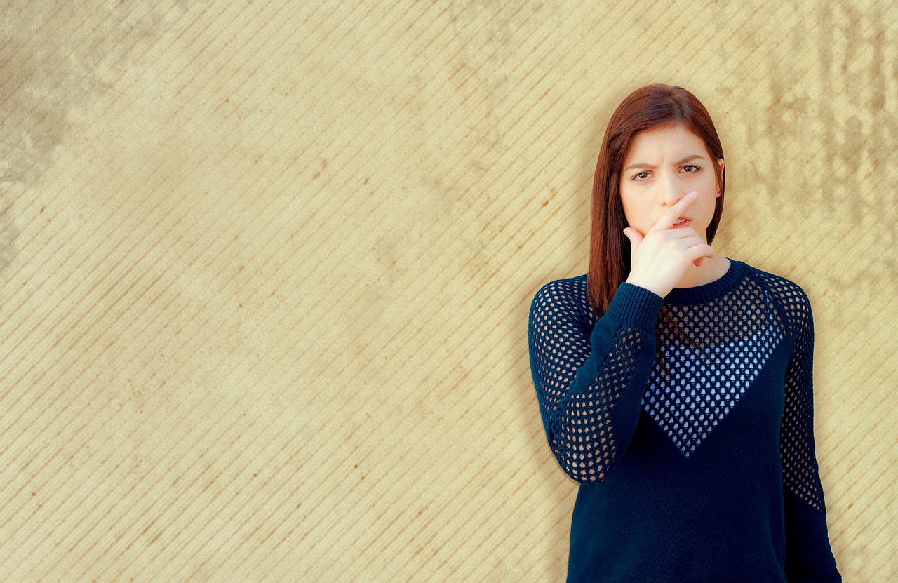 Covering Their Face or Touching Their Neck (Image Credits: Pixabay)