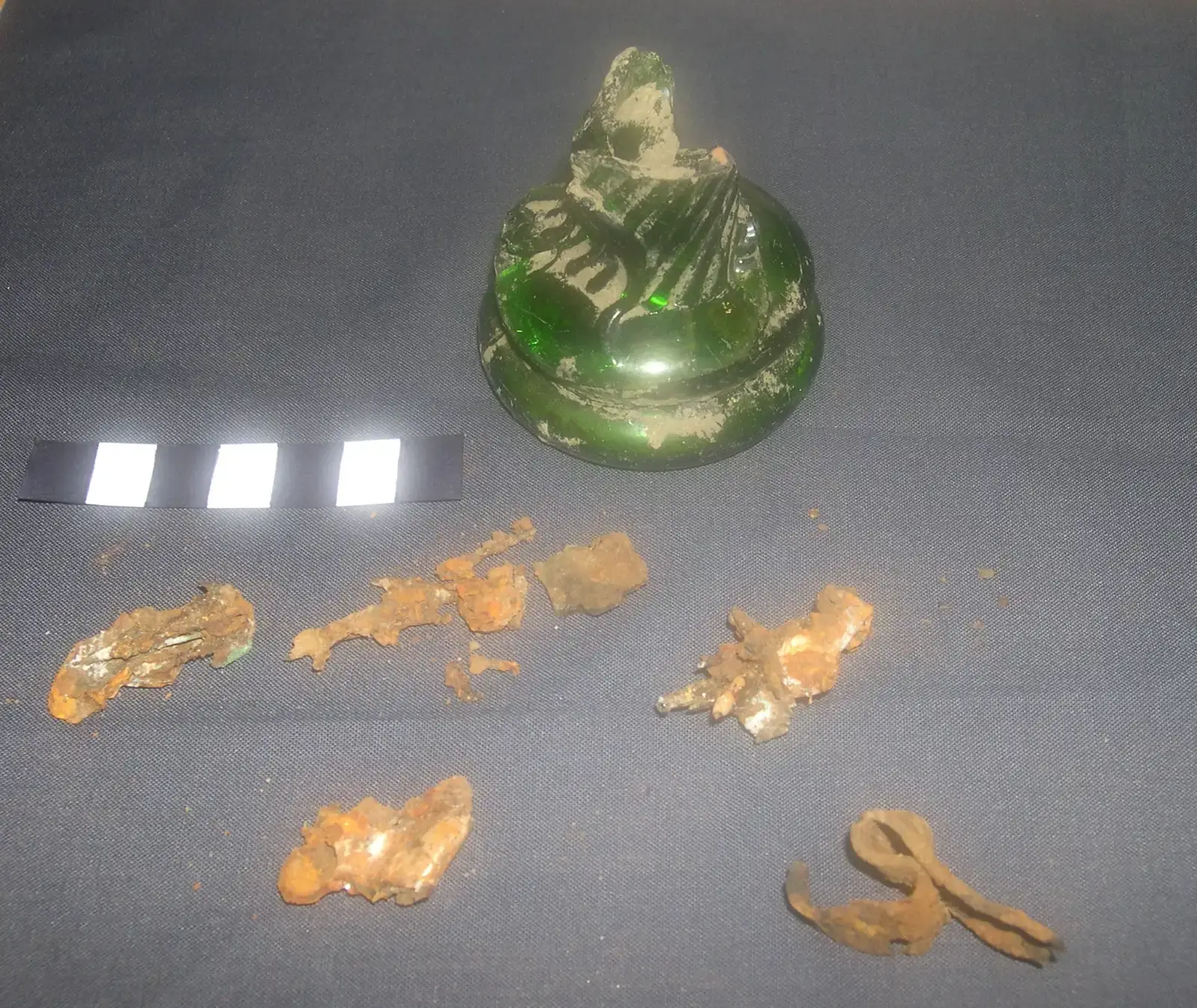 #9 - Witch Bottles Filled With Nails, Hair, and Urine (By The Portable Antiquities Scheme, Adam Daubney, 2003-12-08 15:04:21, CC BY-SA 4.0)