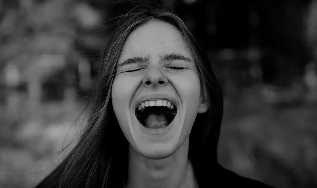 How Trauma And Early Experiences Shape “Inappropriate” Laughter (Image Credits: Unsplash)