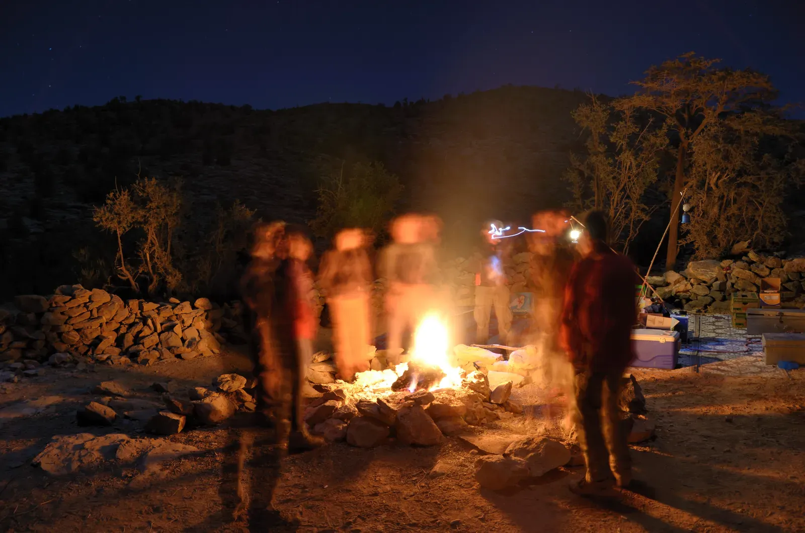 The Unexpected Mental Health Upside Of Fire Time (Around the campfire, CC BY 2.0)