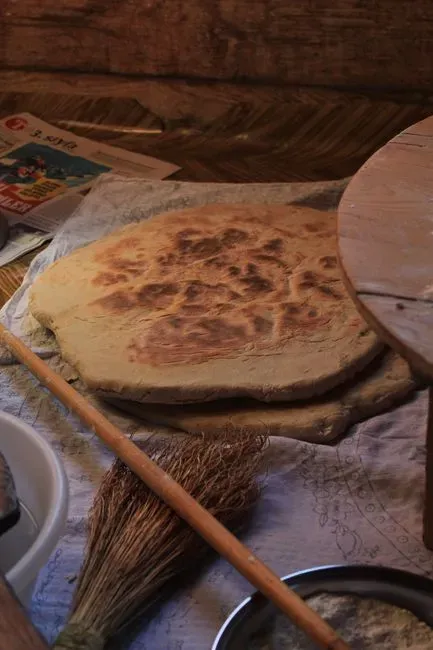 #8 - Charred Bread, Patties, and Porridge Made From Grass Seeds (Image Credits: Pexels)