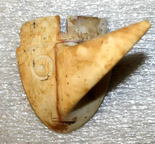 9. Long-Nosed God Maskettes and Copper Elites: Power Cast in Metal and Shell (By Uyvsdi, Public domain)