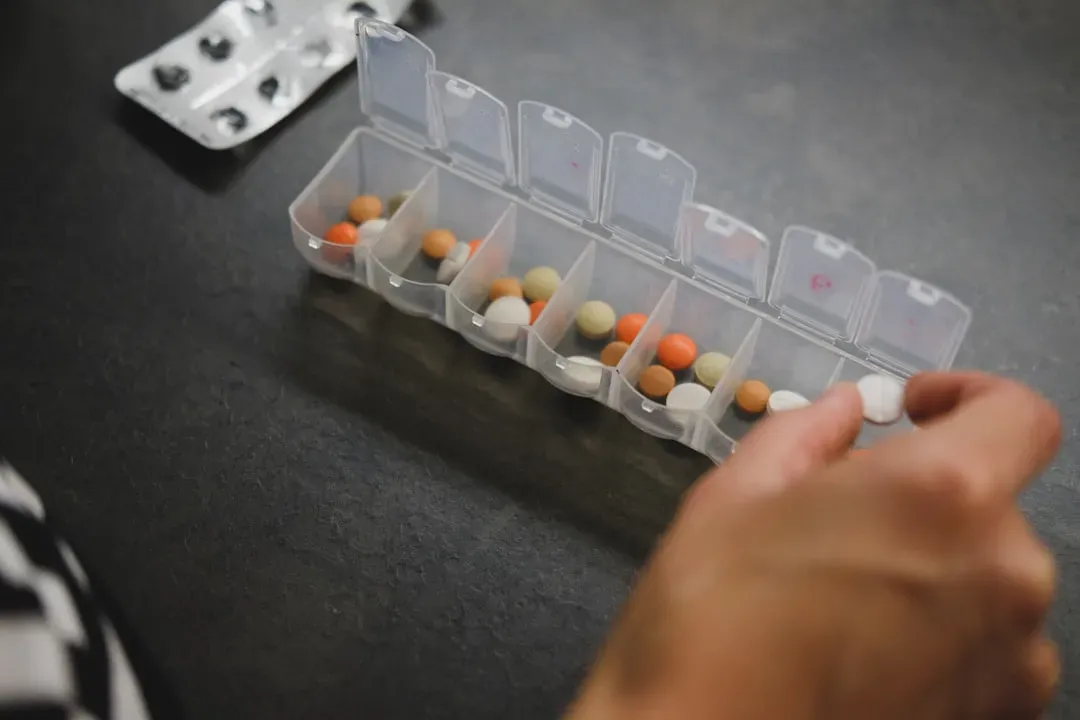#2 - Medication Bottles and Pill Organizers on the Counter (Image Credits: Unsplash)