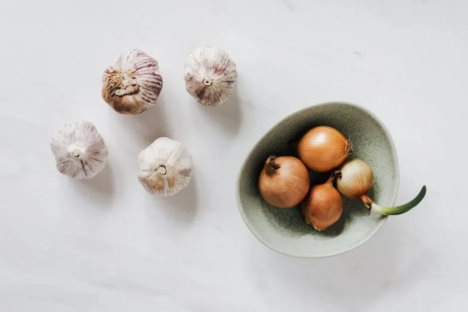 4. Onions, Garlic, and Alliums (Image Credits: Pexels)
