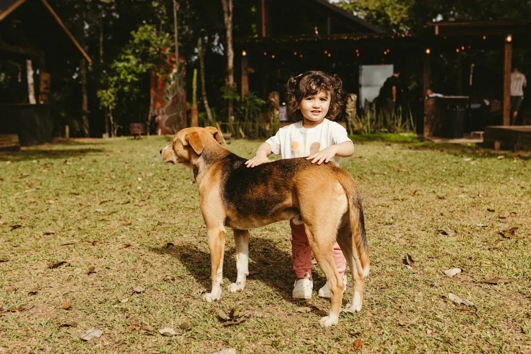 #3 - Letting Kids Ride Dogs Like Horses (Image Credits: Unsplash)