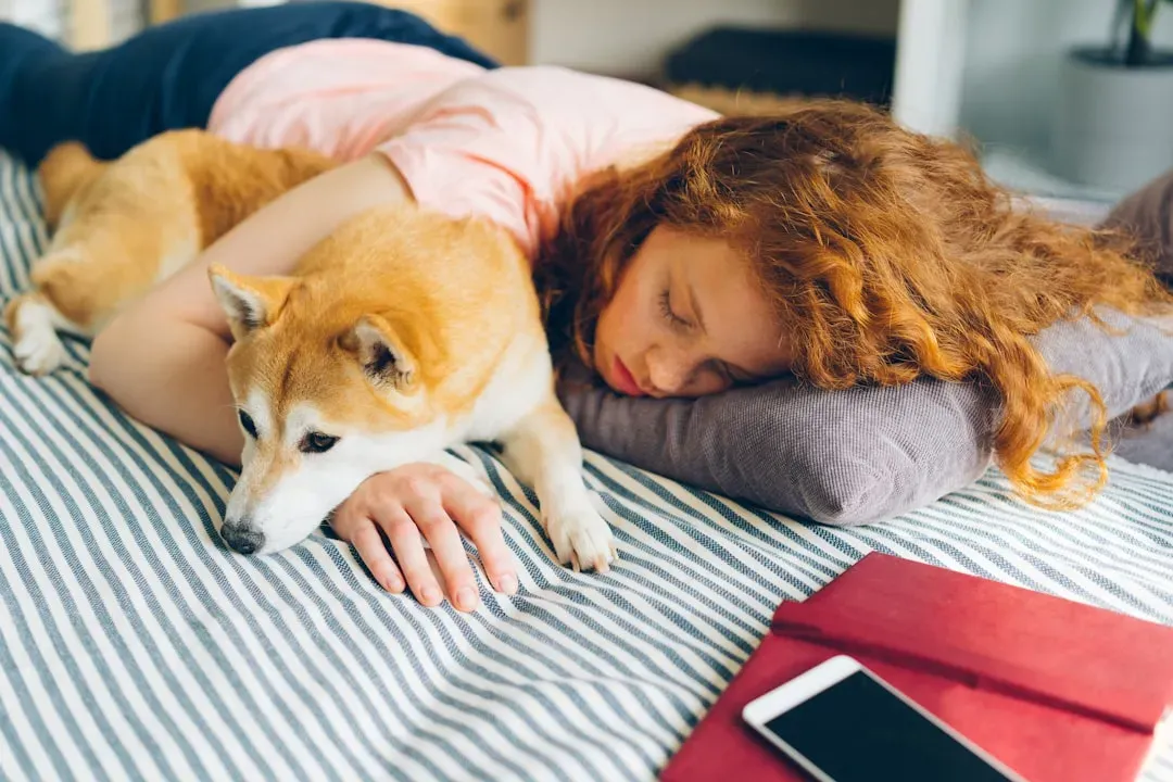 #3. They Sleep as Close to You as Physically Possible (Image Credits: Unsplash)