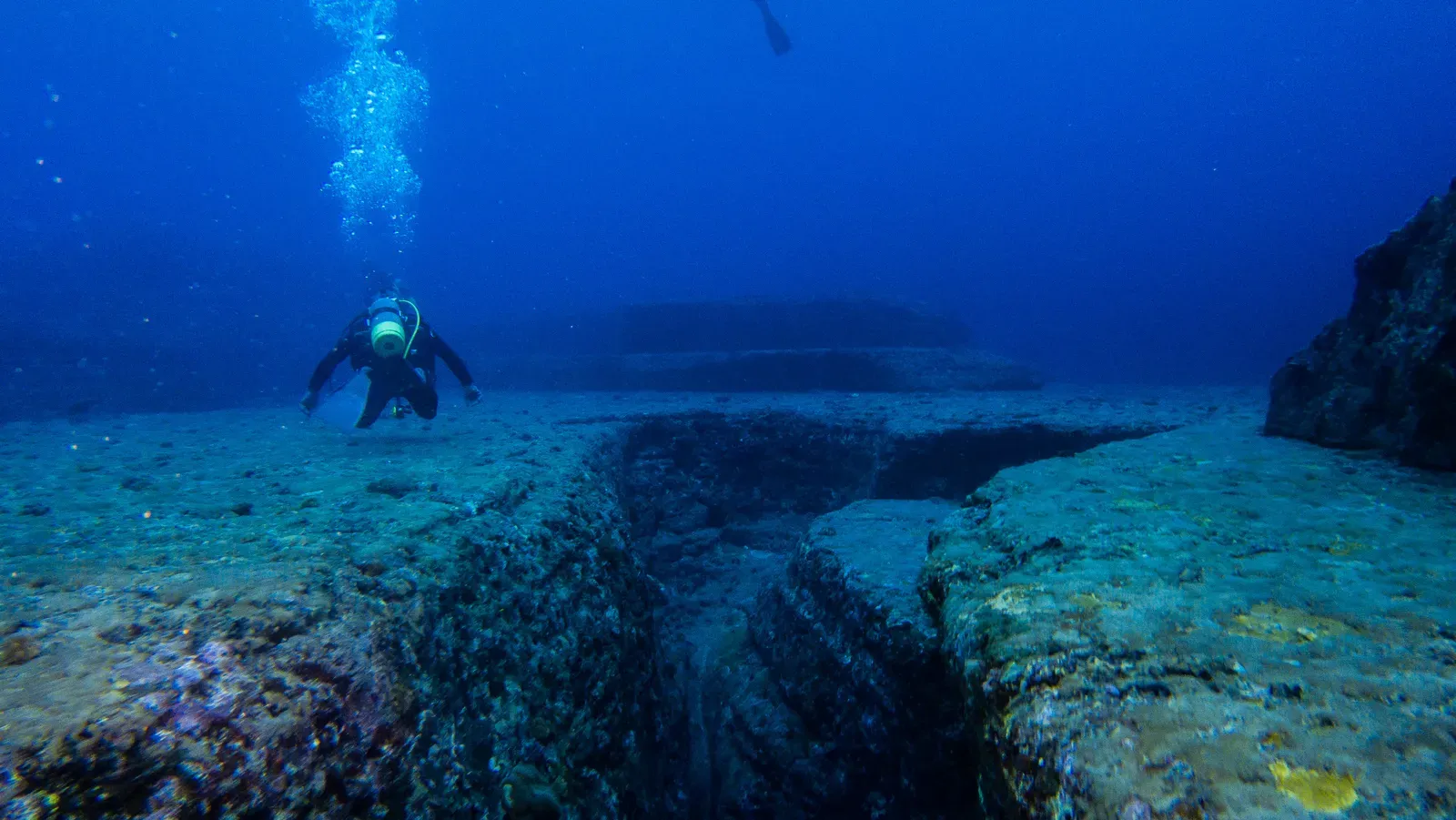 The Yonaguni Monument: Ancient City or Natural Formation? (Image Credits: Wikimedia)