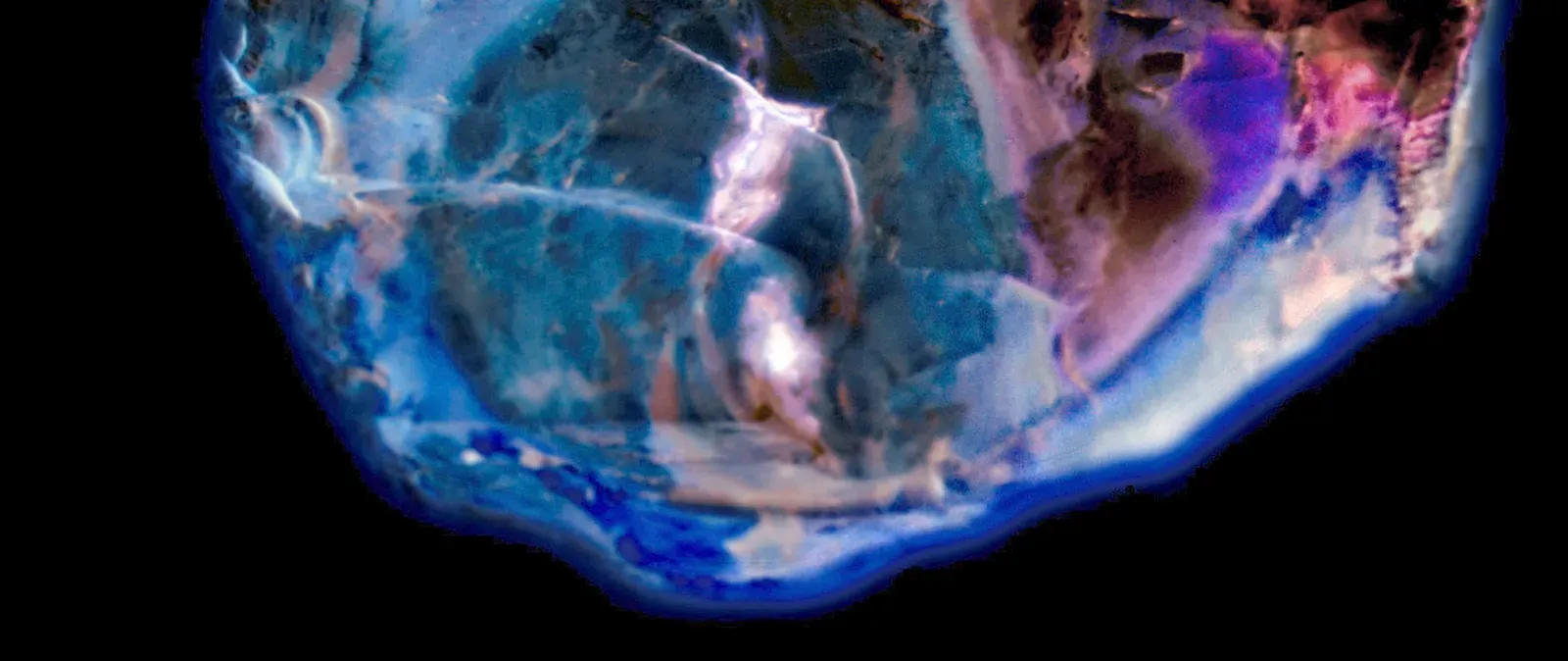 What Scientists Actually Mean By “Hologram” (The Unicorn Petroglyph was discovered as a surface sample from rural Missouri (USA) in the year 1994. A Petro Photoglyph or photograph inscribed stone, The Unicorn Petroglyph projects photographic detailed hologram images when subjected to a sphere of selective spectrum specific illumination. The whole recordings or hologram projections from The Unicorn Petroglyph can be defined as a visual codex with many references to the verses found in The Book of JOB 39-41., CC BY-SA 3.0)