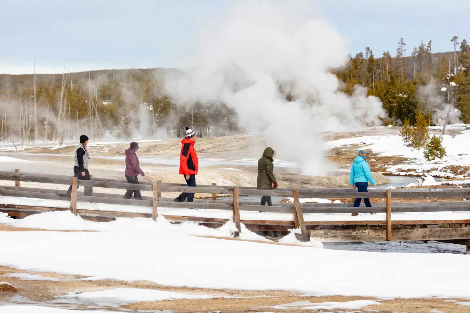 How You Can Read The Landscape More Wisely On Your Next Visit (Group watches Cliff Geyser erupt from the boardwalk, Public domain)