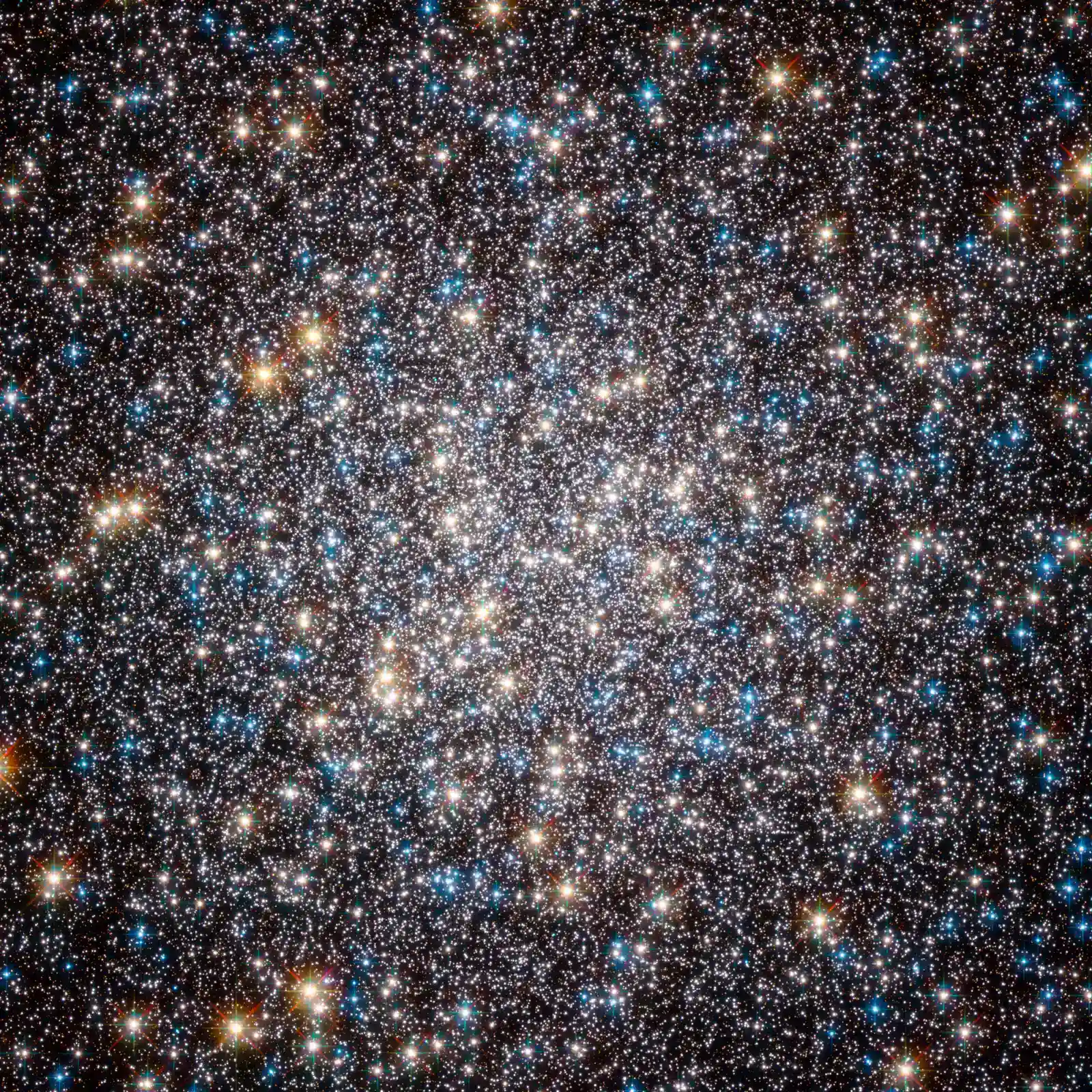 7. The Hercules Globular Cluster (M13) (By ESA/Hubble and NASA, Public domain)