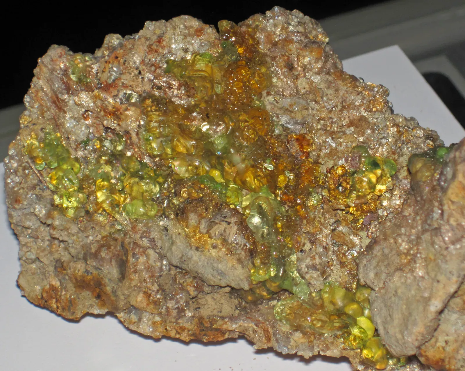 11. Radioactive Glow and Phosphorescence: Uranium Country in the West (Luminescent hyalite opal (Sierra Madre Occidental Volcanic Province, mid-Tertiary; Zacatecas, Mexico) 6, CC BY 2.0)