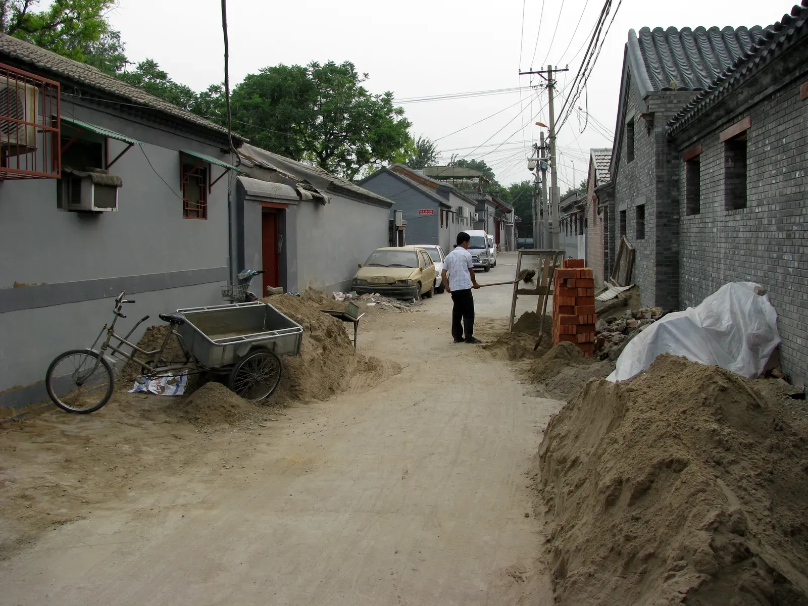 10. Beijing’s Buried Courtyards Beneath Expanding Districts (A Beijing hutong, CC BY 2.0)