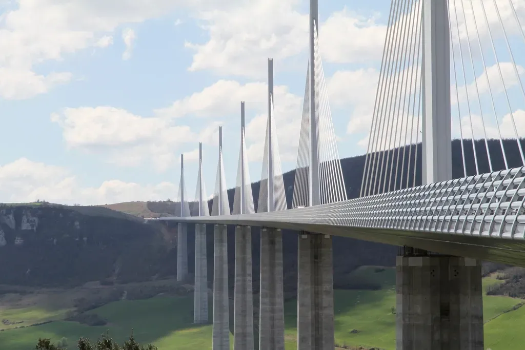 Millau Viaduct: A Ribbon of Steel Above the Clouds (Image Credits: Rawpixel)