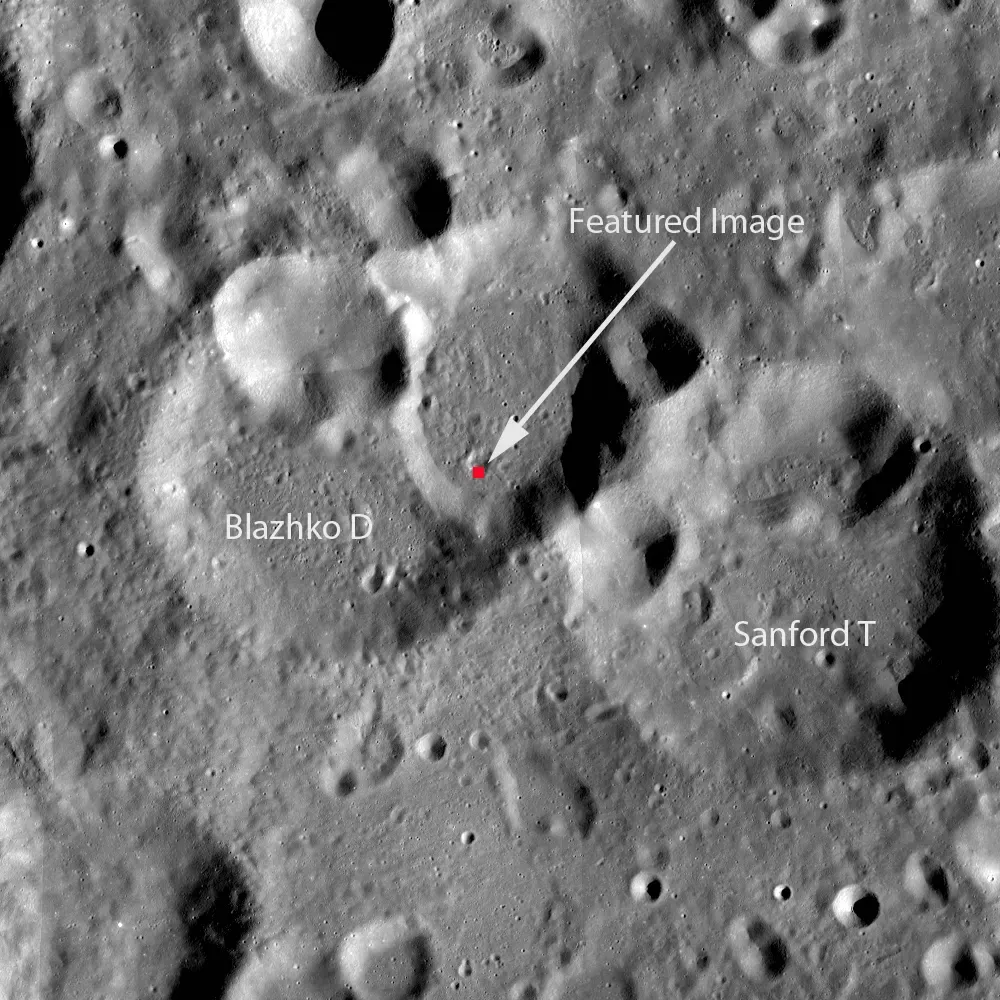Wrinkled Surface: Lobate Scarps And A Shrinking Moon (Lobate Scarp or Fluidized Ejecta?, Public domain)